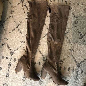 Over the knee tie boots